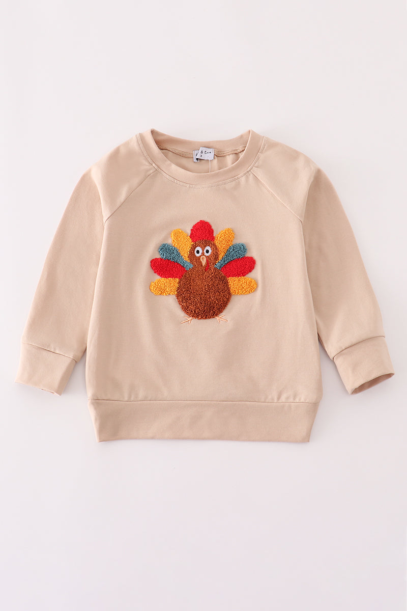 Beige turkey french knot top
