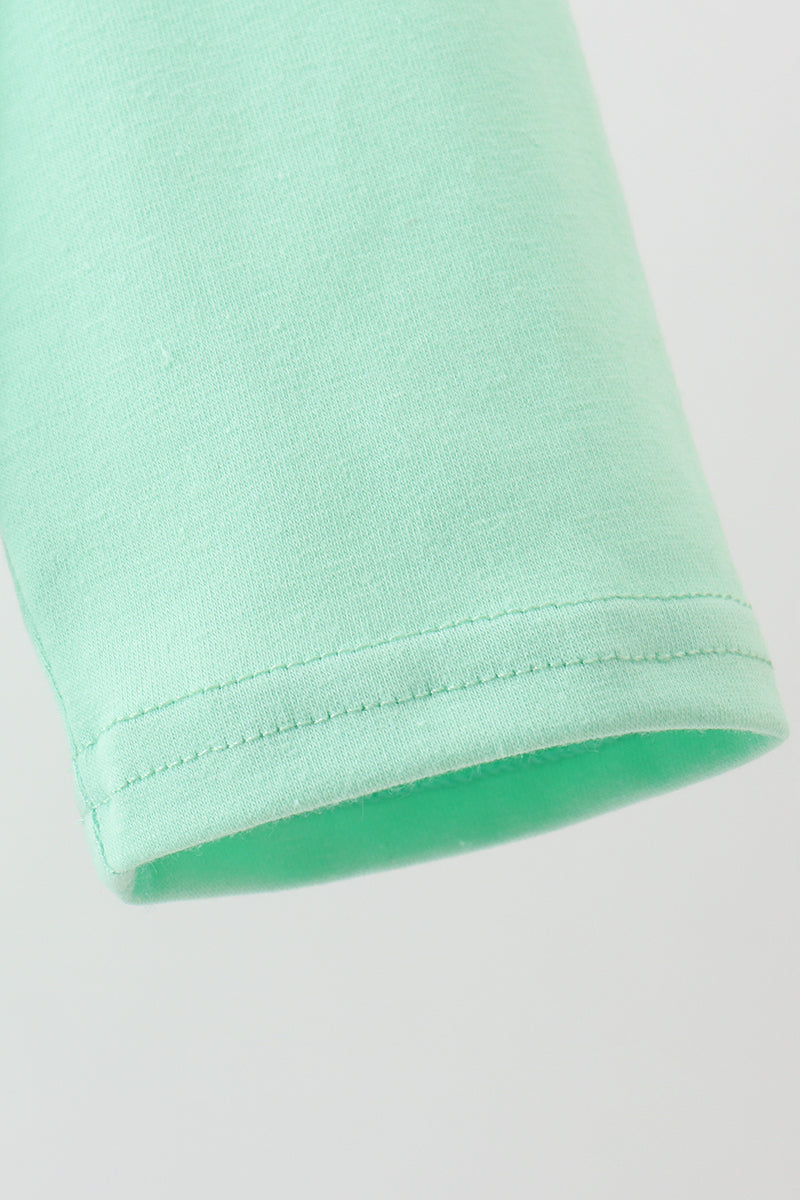 Green parade embroidery top