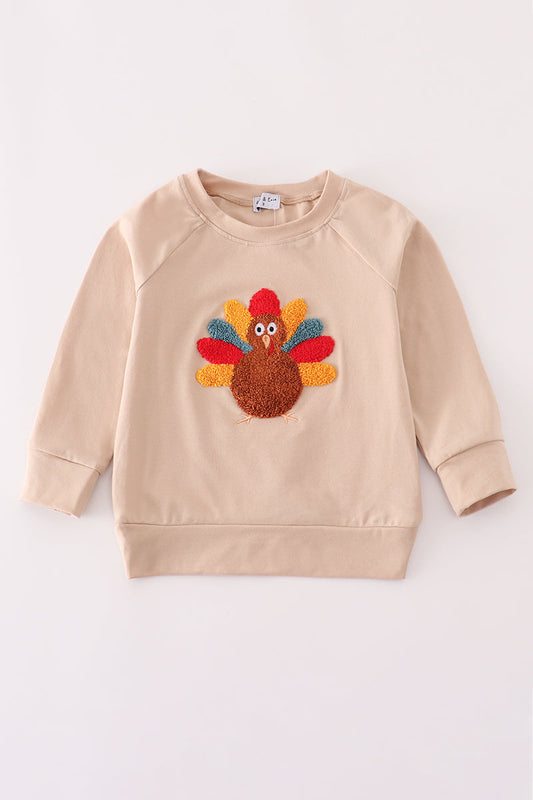 Beige turkey french knot top
