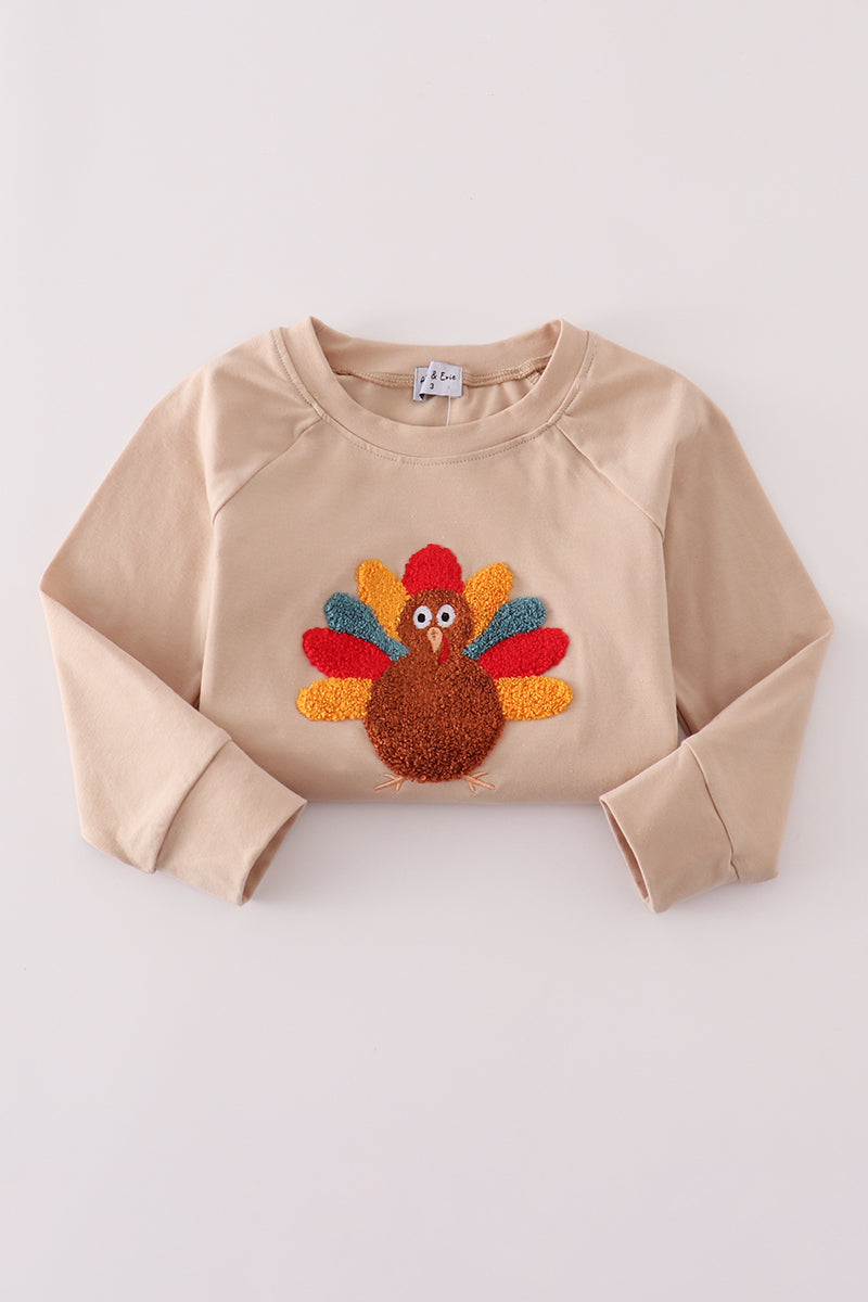 Beige turkey french knot top