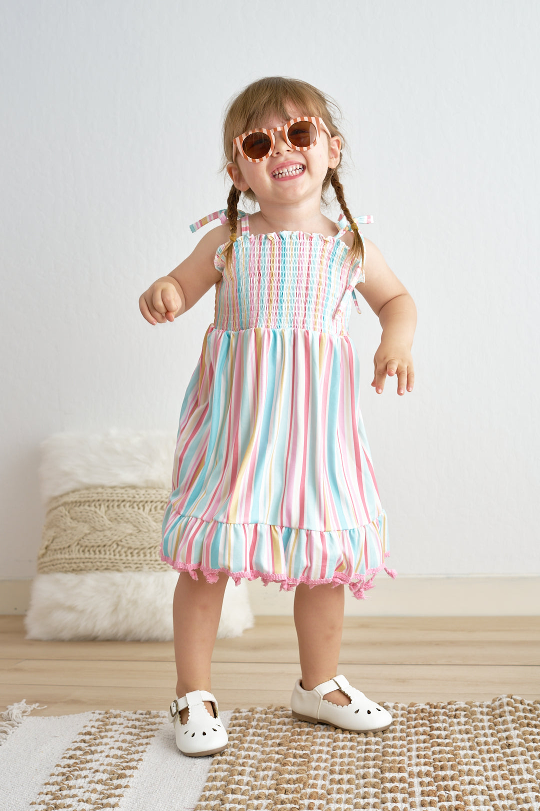 Pink stripe smocked strap dress